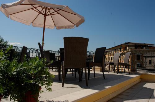 Hotel Latinum - Tap to explore photos