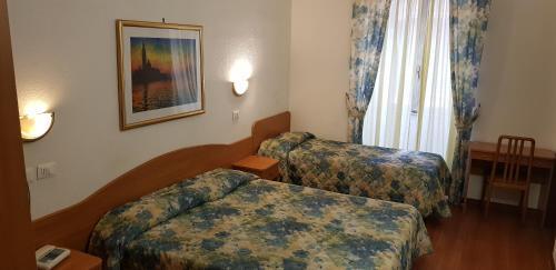 Tirreno Hotel - Tap to explore photos