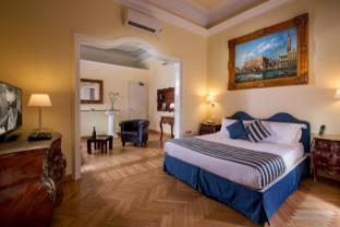 Golden Tulip Rome Piram - Tap to explore photos