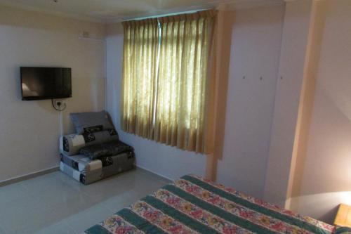 New Orchid Hotel Room Type - Deluxe Family Room