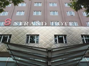 Strand Hotel - Tap to explore photos