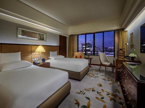 The Portman Ritz-Carlton, Shanghai - Tap to explore photos