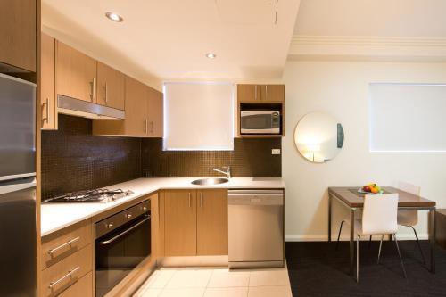 APX World Square Room Type - Executive Studio with Balcony (Limited Housekeeping)