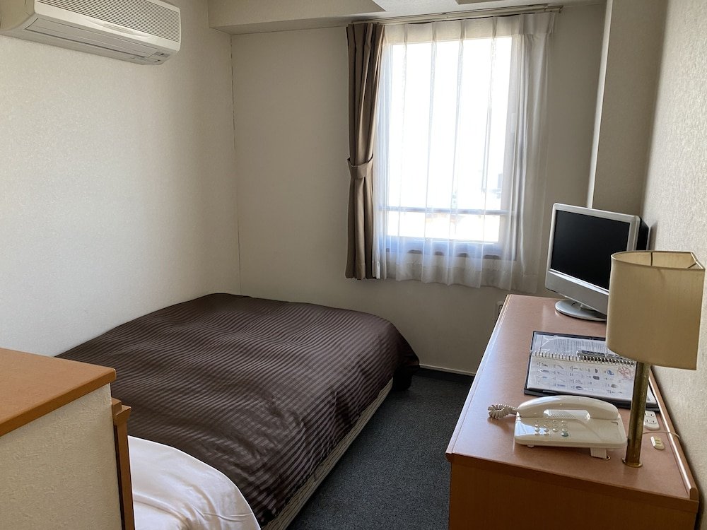 Sakura Hotel Hatagaya - Tap to explore photos