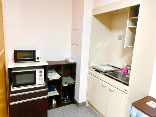Sakura Hotel Jimbocho - Hostel Room Type - Apartment Room with Kitchen (3 Bunk-Beds)