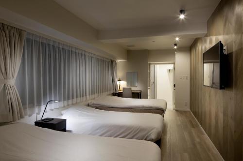 City Hotel N.U.T.S. Room Type - Superior Family Room