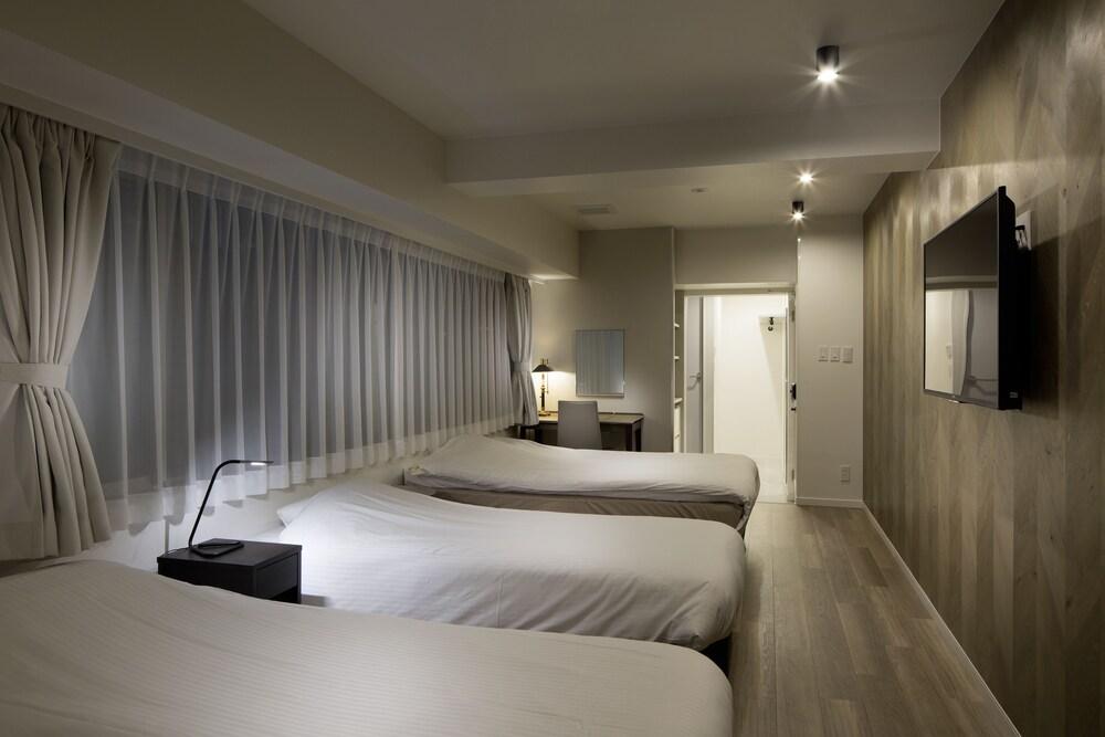 City Hotel N.U.T.S. Room Type - Comfort Room, Multiple Beds, Non Smoking
