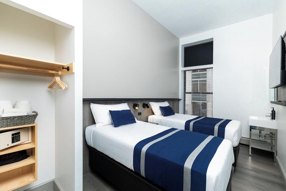 Americana Inn Room Type - DOUBLE ROOM(Separate Beds)-SHARED BATHROOM Americana Inn Room Type - DOUBLE ROOM(Separate Beds)-SHARED BATHROOM