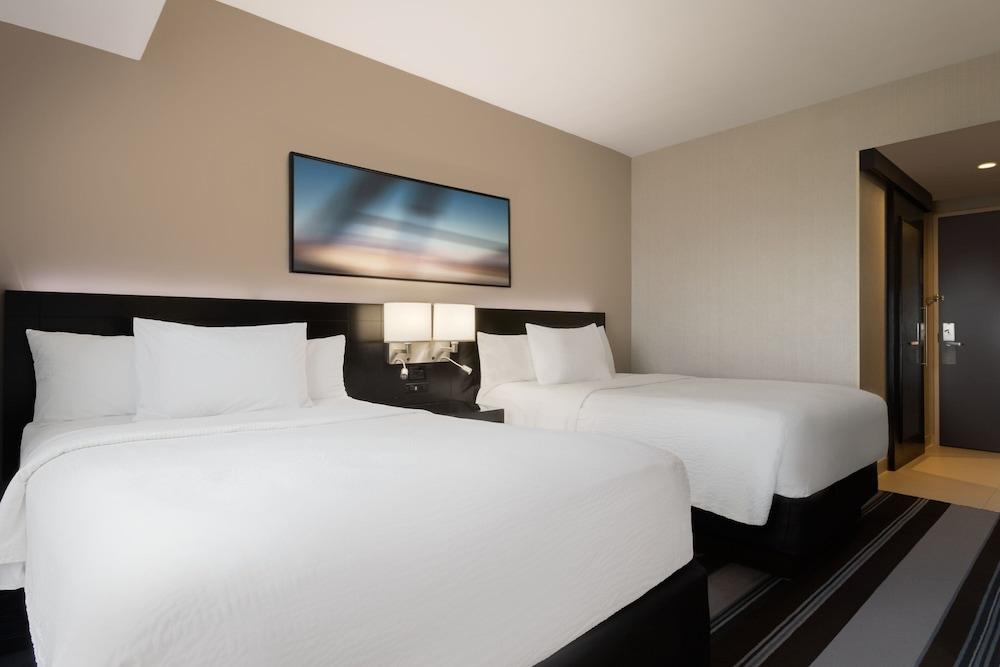 Courtyard by Marriott New York JFK Airport - Tap to explore photos