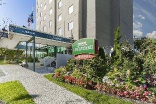 Courtyard by Marriott New York JFK Airport - Tap to explore photos