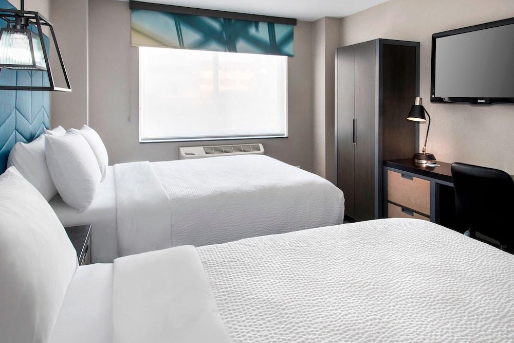 Four Points by Sheraton Manhattan SoHo Village - Tap to explore photos