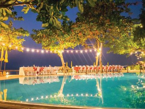Sunset Village Beach Resort - Tap to explore photos