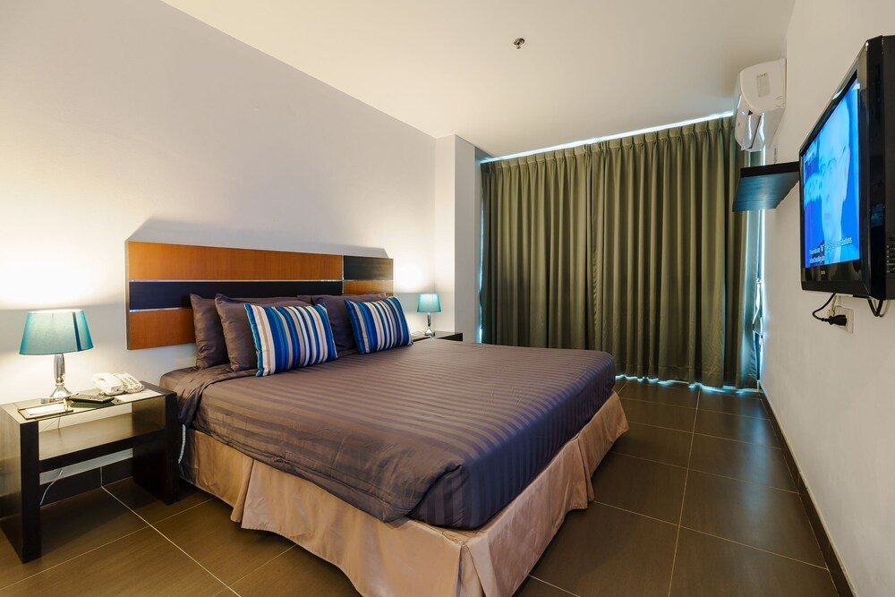 Vogue Hotel Pattaya - Tap to explore photos