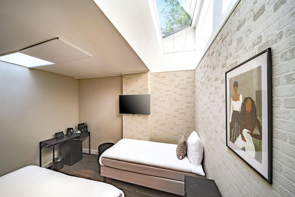 Atlantis Hotel Amsterdam Room Type - Senior Triple Room