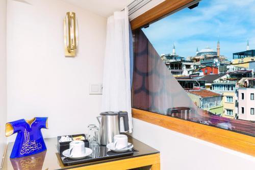 Acra Hotel - Special Category - Tap to explore photos