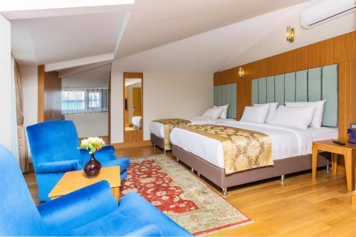 Acra Hotel - Special Category Room Type - Triple Room with Balcony Acra Hotel - Special Category Room Type - Triple Room with Balcony