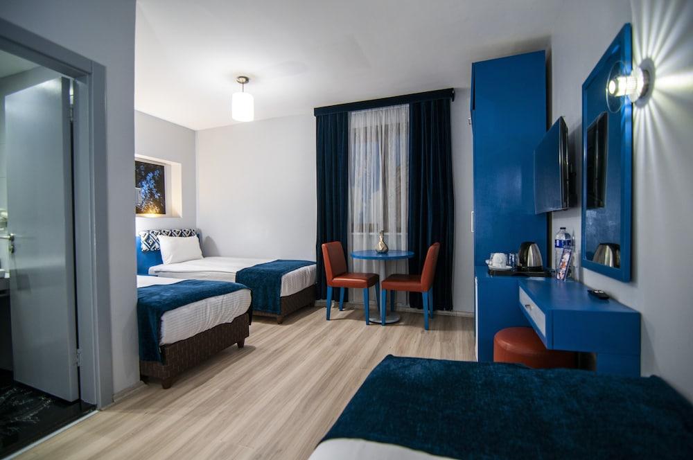 Lapis Inn Hotel & Spa Room Type - Central Triple Room - Ideal for 3 Guests