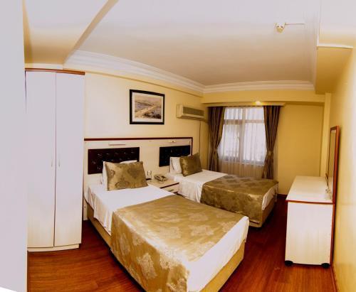 Tayhan Hotel - Tap to explore photos