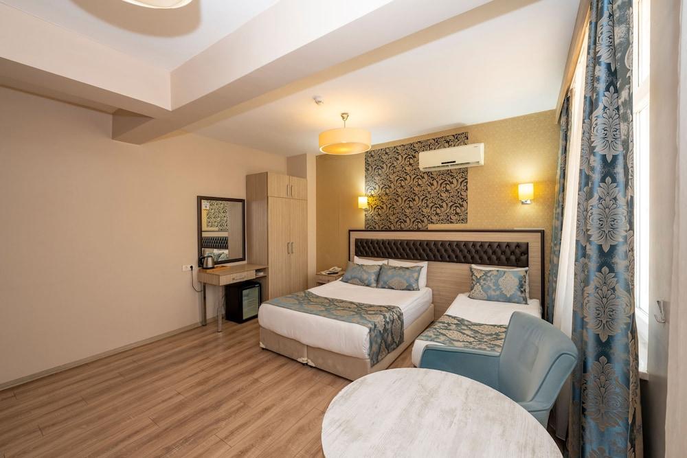 Tugra Hotel Room Type - Deluxe Triple Room