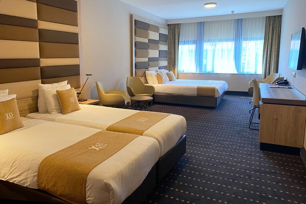 XO Hotels Blue Square Room Type - Standard Quadruple Room