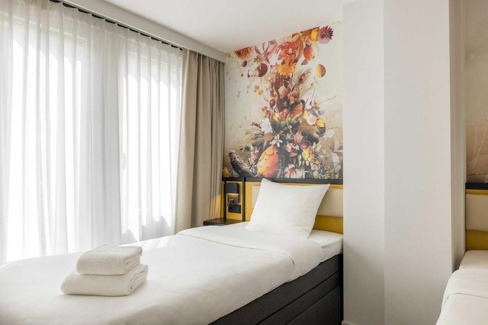 Dutch Design Hotel Vondelpark - Tap to explore photos