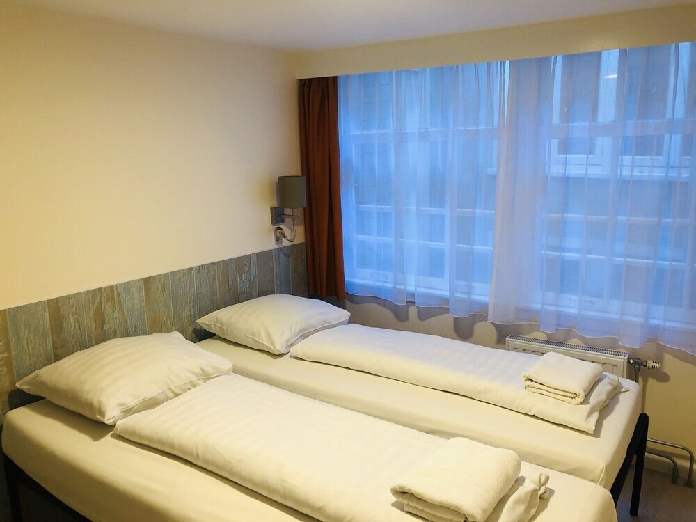 Hotel Damrak Inn Room Type - Twin Room with Shared Bathroom