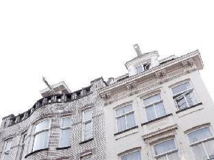 Hotel Damsquare - Tap to explore photos
