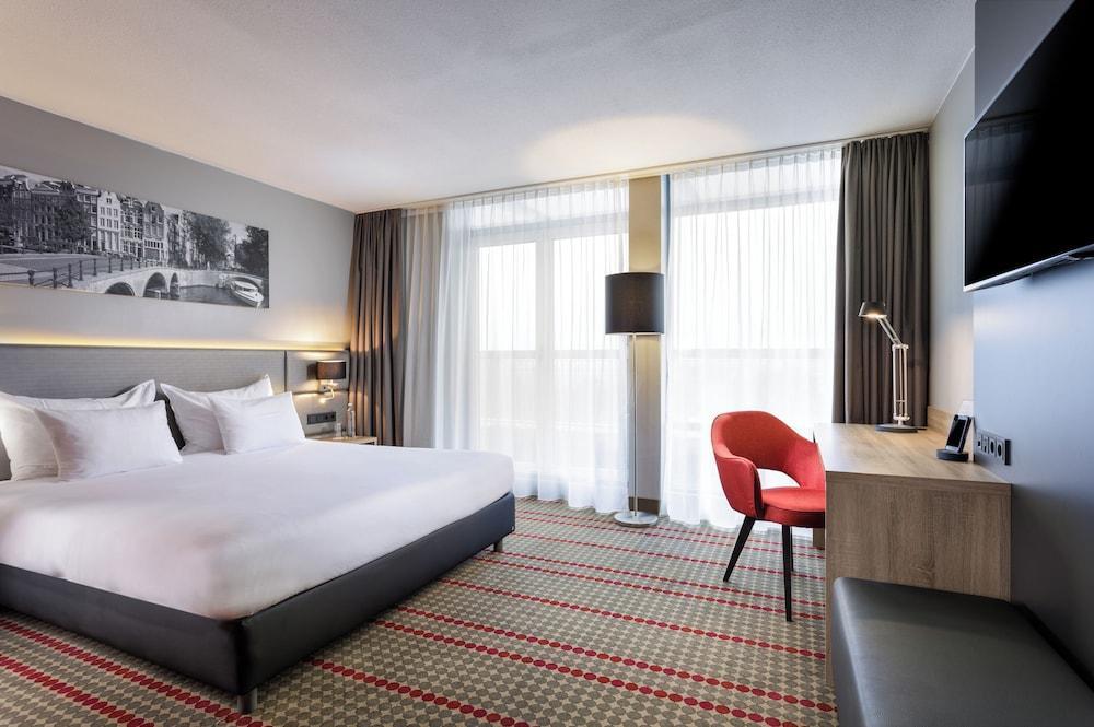 Ramada by Wyndham Amsterdam Airport Schiphol - Tap to explore photos