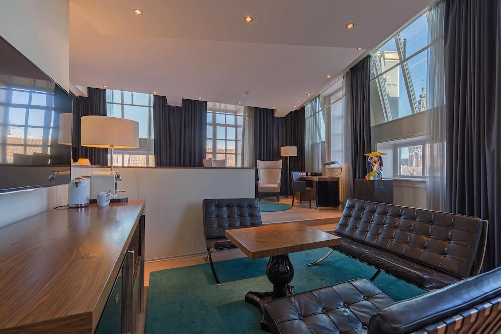 Radisson Blu Hotel, Amsterdam Room Type - New Amsterdam Suite - Canal View Radisson Blu Hotel, Amsterdam Room Type - New Amsterdam Suite - Canal View