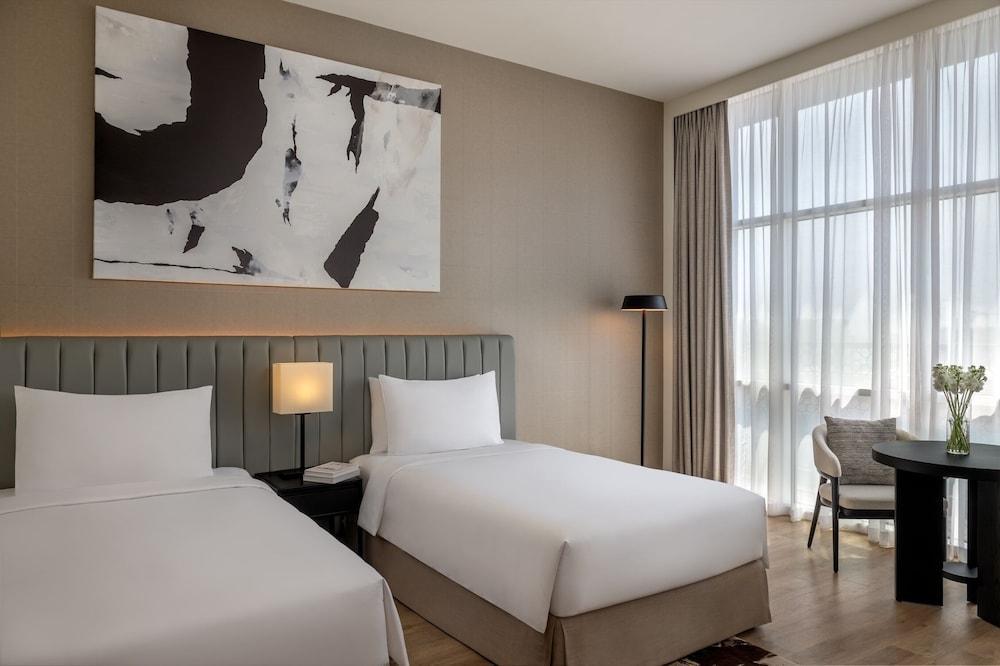 YAS PLAZA MARINA by IHG - Theme Park Access Room Type - 2 Twin Deluxe Plaza View Theme Park Access