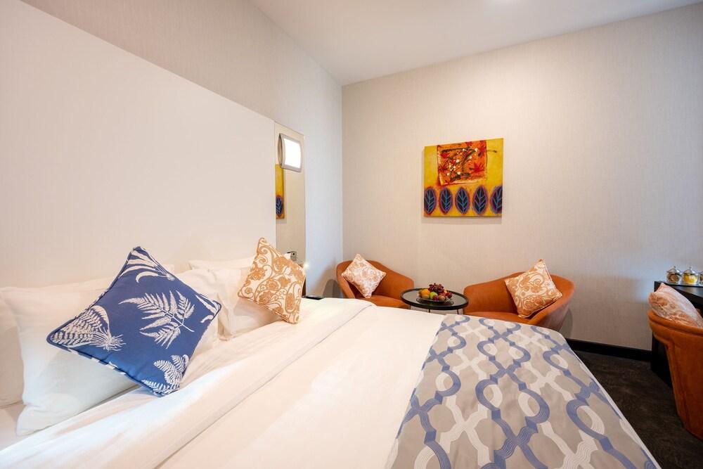 Ramada Encore by Wyndham Doha Room Type - Deluxe Queen Room