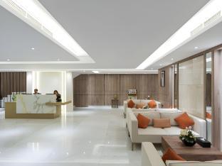 Corp Executive Hotel Doha Suites - Tap to explore photos