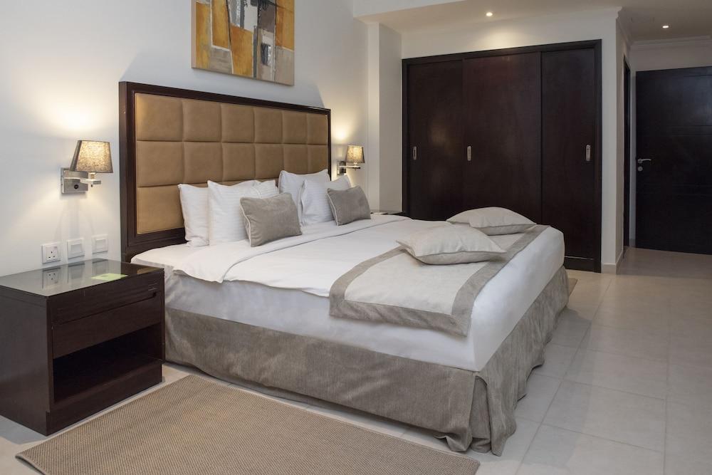 Corp Executive Hotel Doha Suites Room Type - Family Three-Bedroom Suite Corp Executive Hotel Doha Suites Room Type - Family Three-Bedroom Suite