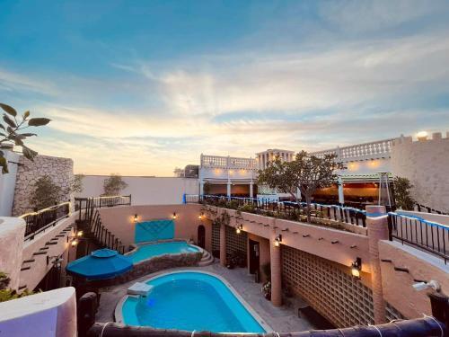 Al Liwan Suites - Tap to explore photos