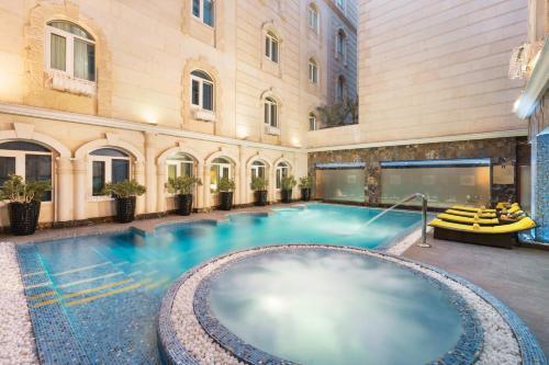 Grand Regency Doha TradeMark Collection by Wyndham - Tap to explore photos