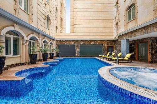Grand Regency Doha TradeMark Collection by Wyndham - Tap to explore photos