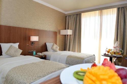 Treffen House Doha - Souq Waqif and next to Msheireb Metro Station Room Type - Twin Room with Balcony