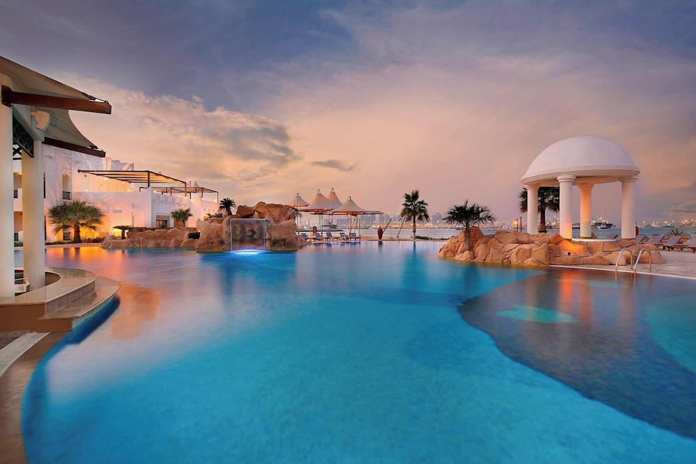 Sharq Village & Spa, a Ritz-Carlton Hotel - Tap to explore photos