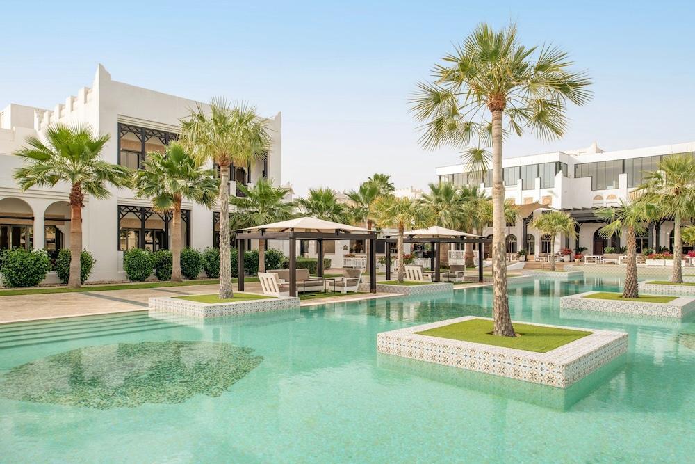 Sharq Village & Spa, a Ritz-Carlton Hotel - Tap to explore photos