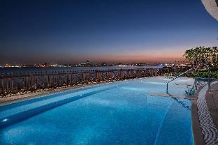 Sheraton Grand Doha Resort & Convention Hotel - Tap to explore photos