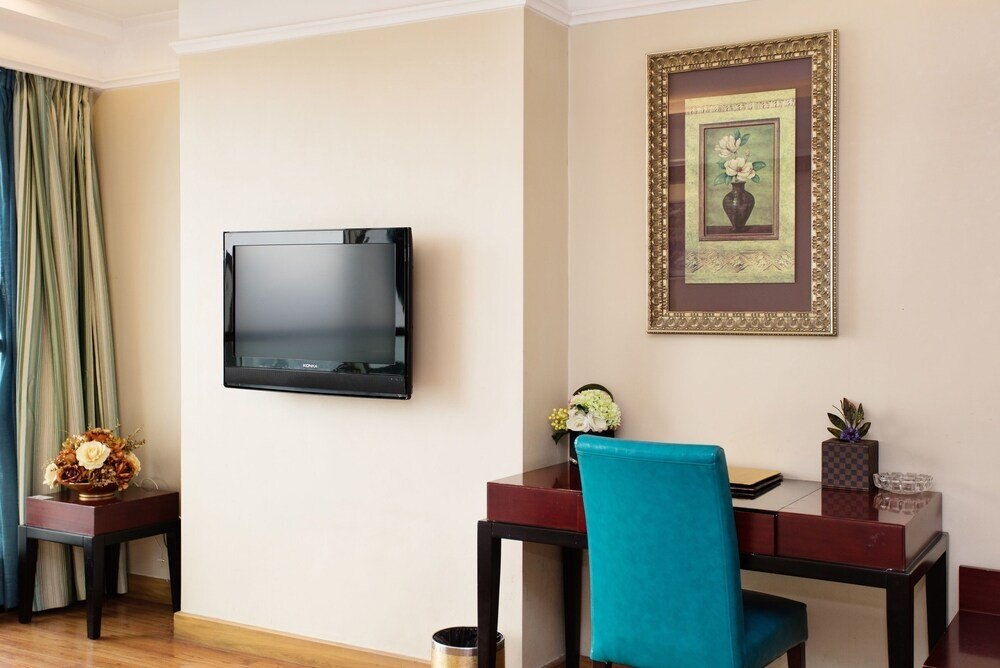 Nomo Service Apartment Grand Continental - Tap to explore photos