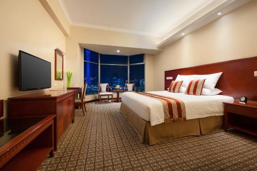 Ramada by Wyndham Pearl Guangzhou - Tap to explore photos