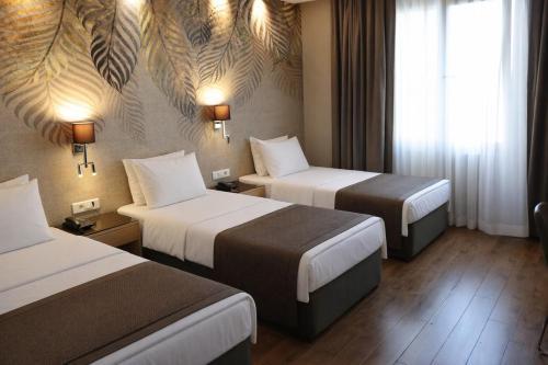 Riva Hotel Taksim Room Type - Triple Room Riva Hotel Taksim Room Type - Triple Room