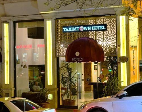 Taximtown Hotel - Tap to explore photos