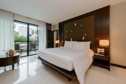 Centara Anda Dhevi Resort & Spa Krabi - Tap to explore photos