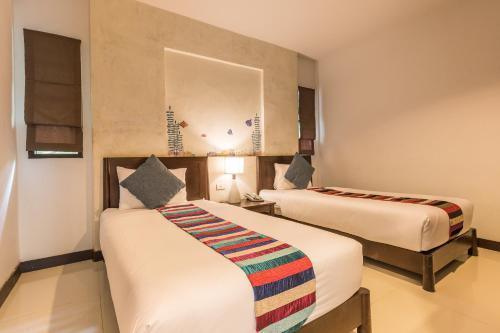 Krabi Aquamarine Resort - Tap to explore photos