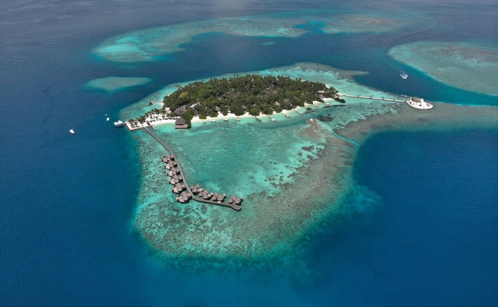 Nika Island Resort & Spa - Tap to explore photos