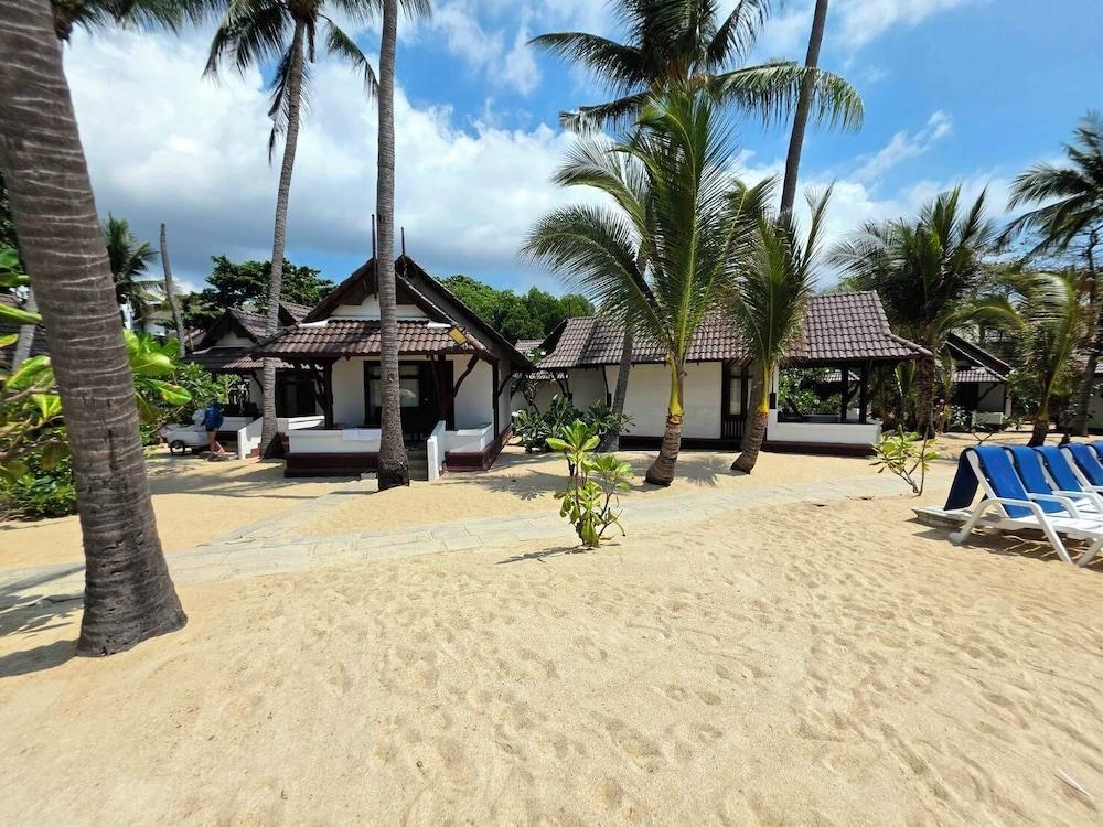 First Bungalow Beach Resort - Tap to explore photos