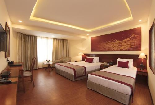 Royal Singi Hotel - Tap to explore photos
