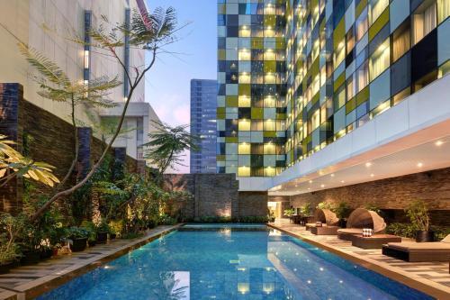 Grand Mercure Jakarta Harmoni - Tap to explore photos